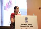 Smt. Smriti Zubin Irani, Hon’ble Minister of Textiles, Government of India addressing the gathering at the inaugural session of the National Workshop on GI and Post-GI Initiatives