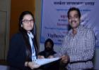 Participant receiving the certificate from Shri Rakesh Garg, Secretary, Textiles Committee